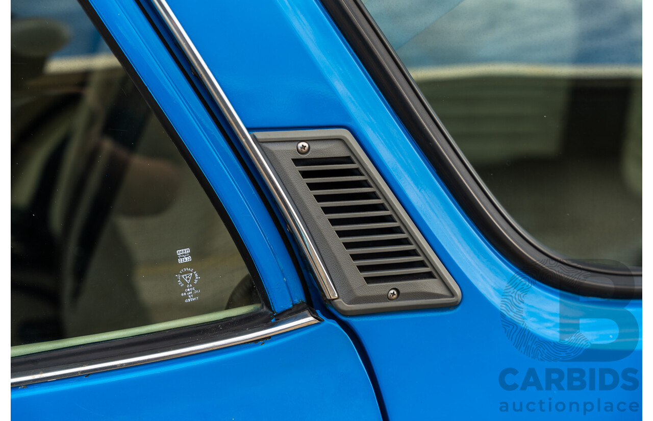 8/1980 Datsun 200b GL 810 4d Wagon Blue 2.0L