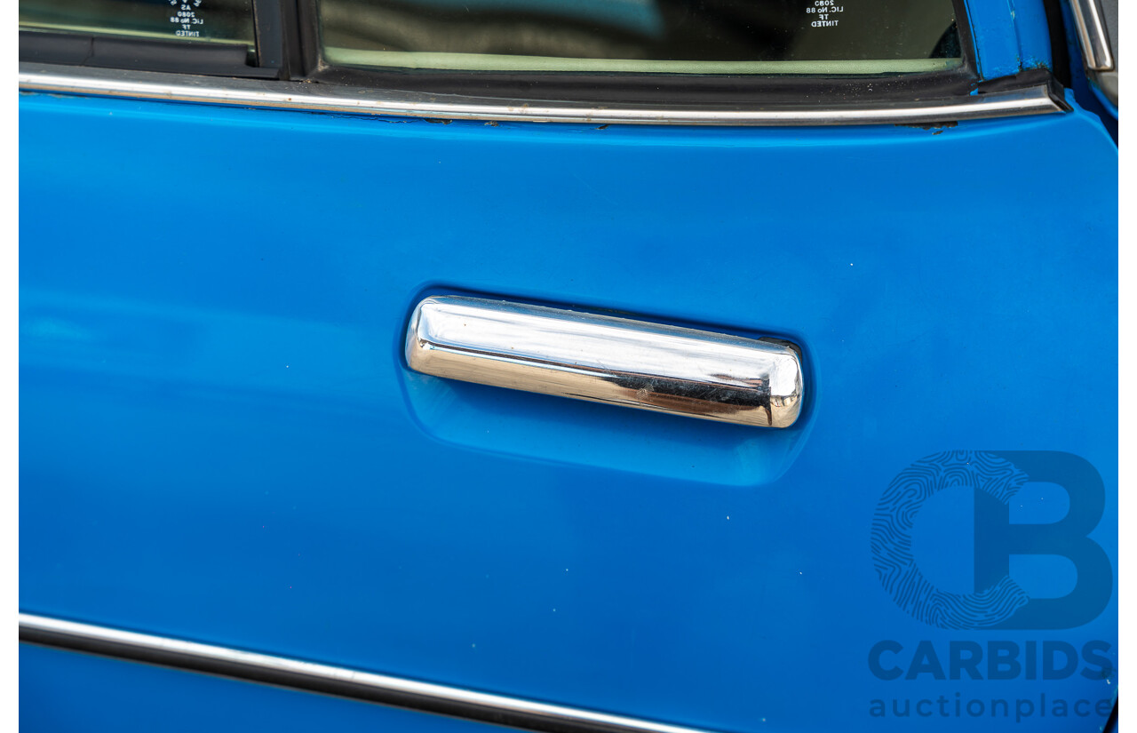 8/1980 Datsun 200b GL 810 4d Wagon Blue 2.0L