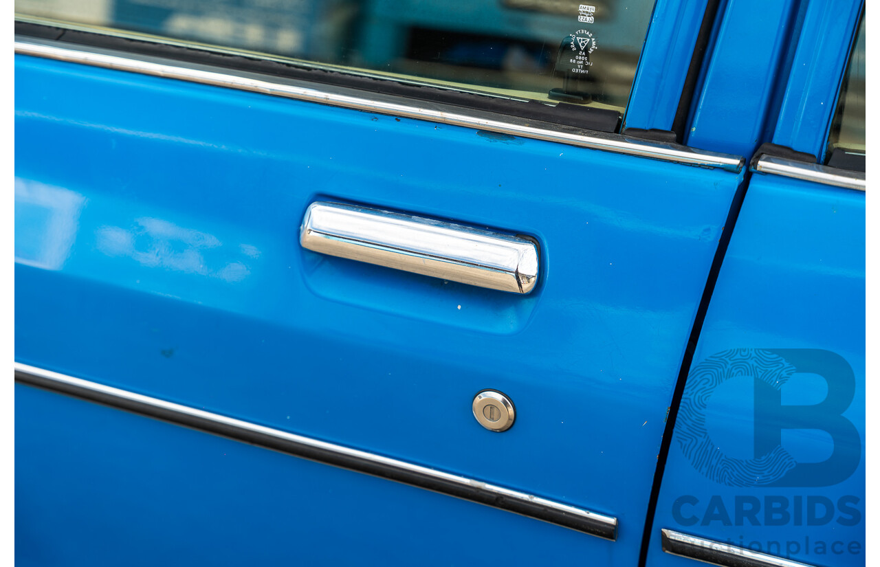 8/1980 Datsun 200b GL 810 4d Wagon Blue 2.0L