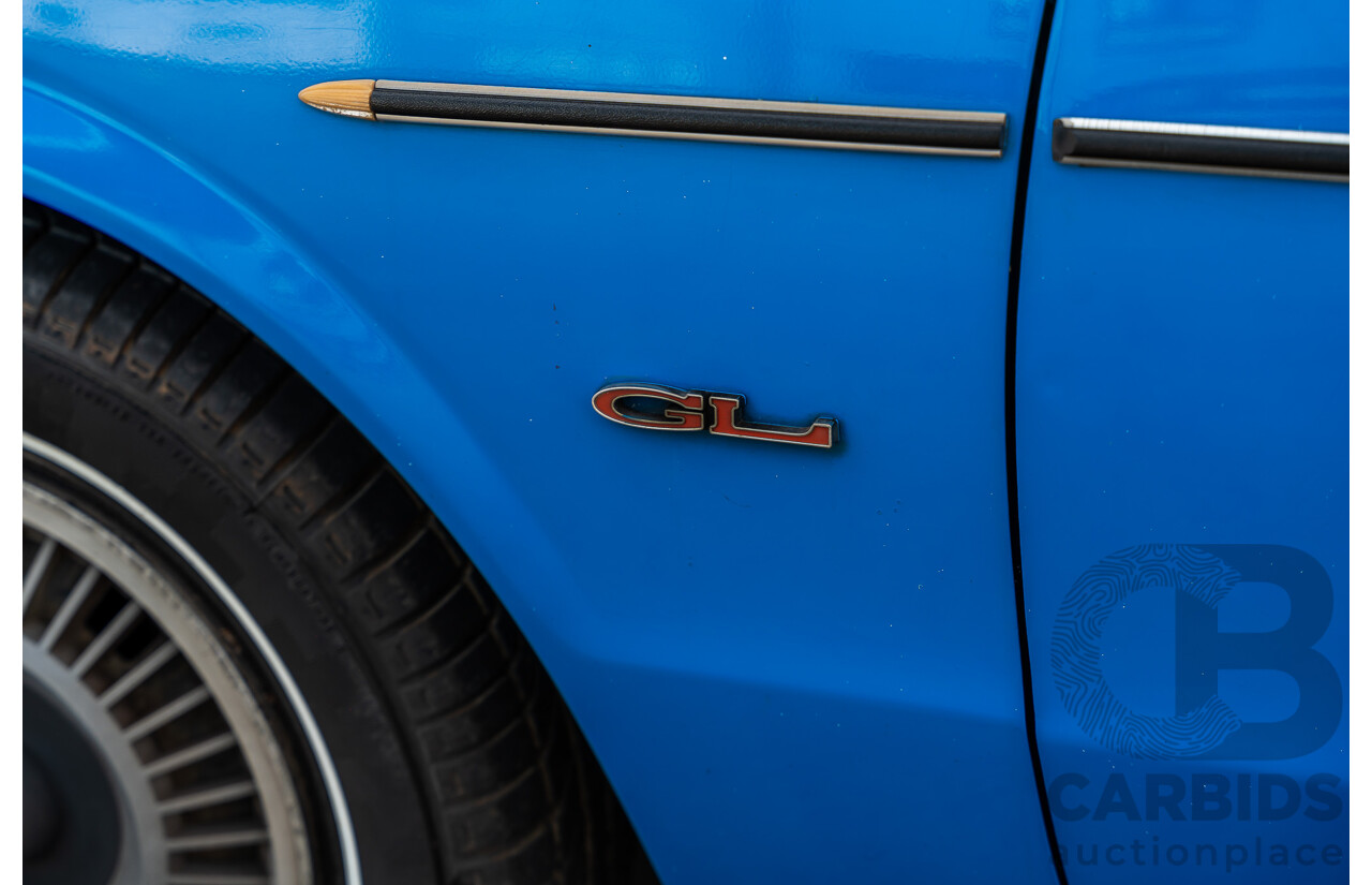 8/1980 Datsun 200b GL 810 4d Wagon Blue 2.0L