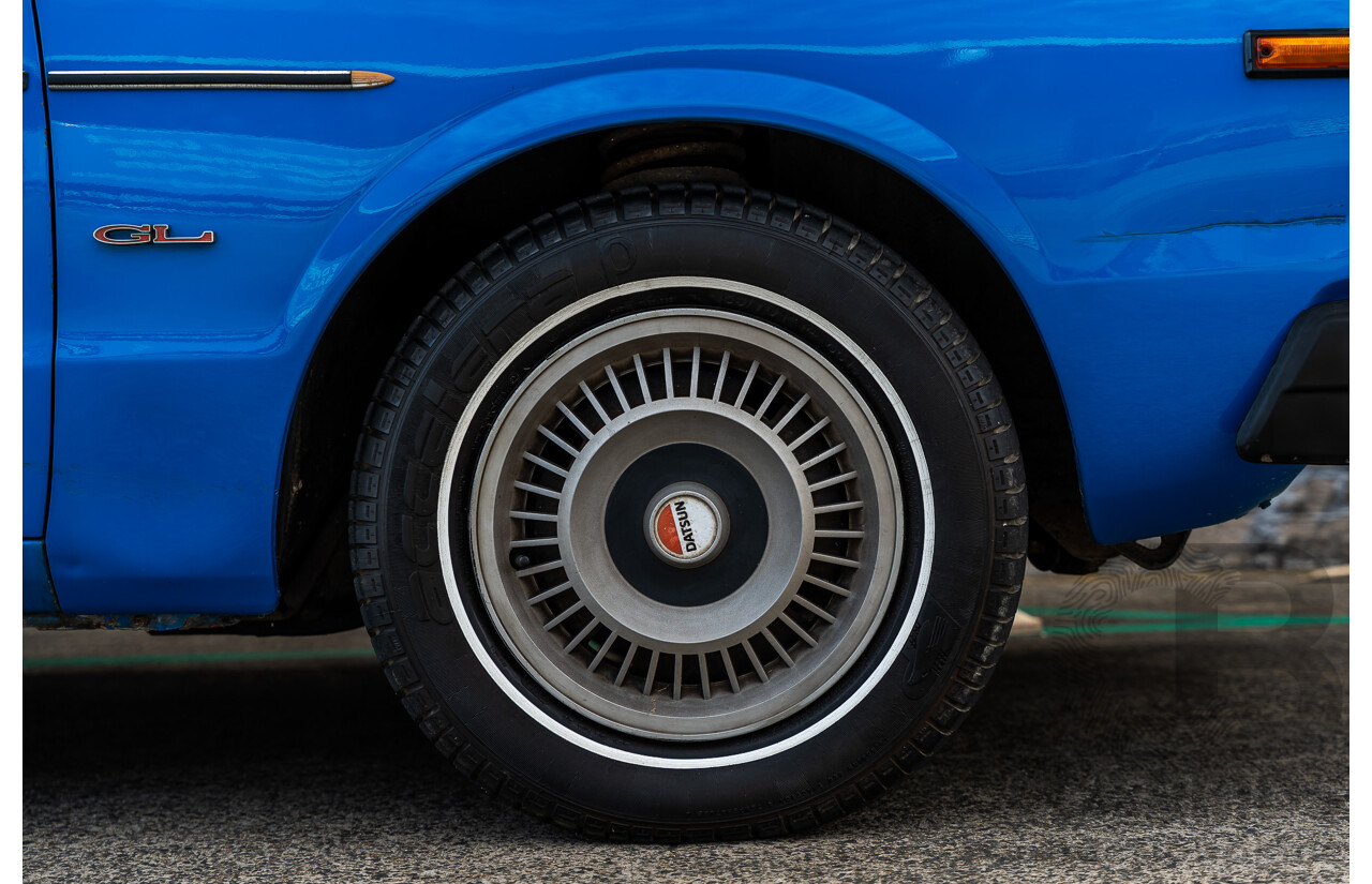 8/1980 Datsun 200b GL 810 4d Wagon Blue 2.0L