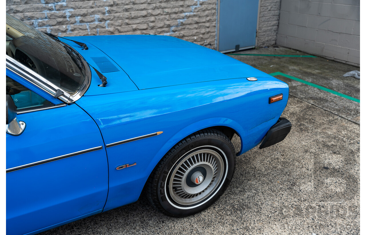 8/1980 Datsun 200b GL 810 4d Wagon Blue 2.0L