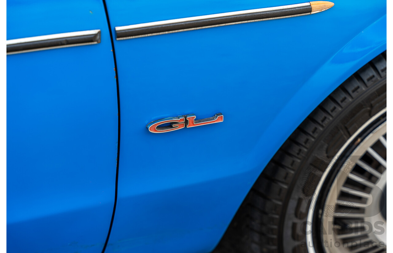 8/1980 Datsun 200b GL 810 4d Wagon Blue 2.0L