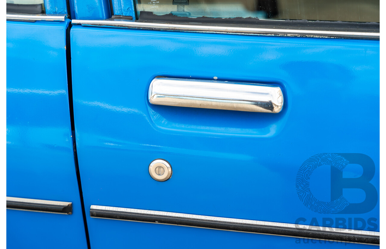 8/1980 Datsun 200b GL 810 4d Wagon Blue 2.0L