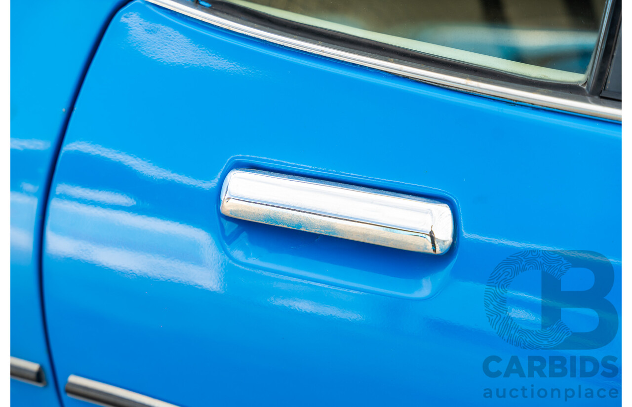 8/1980 Datsun 200b GL 810 4d Wagon Blue 2.0L