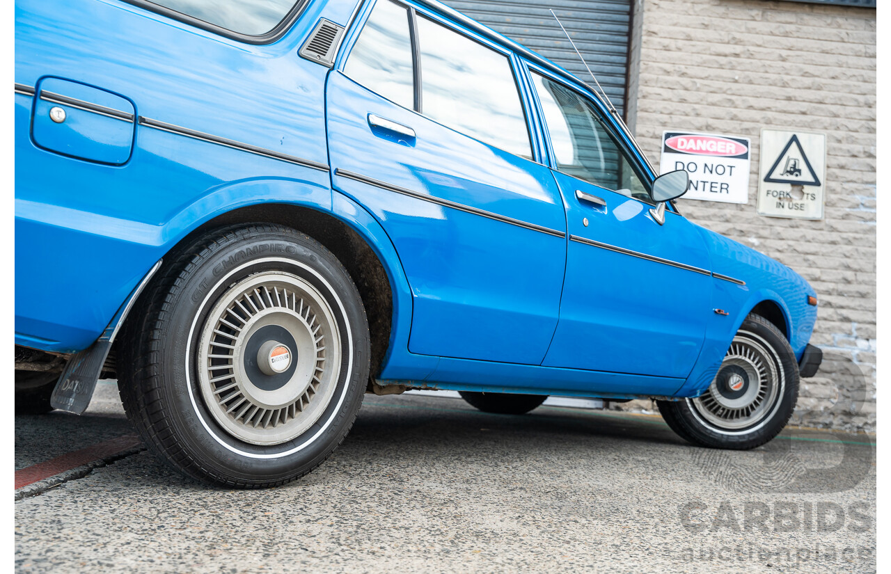 8/1980 Datsun 200b GL 810 4d Wagon Blue 2.0L
