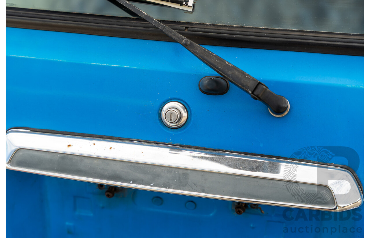 8/1980 Datsun 200b GL 810 4d Wagon Blue 2.0L