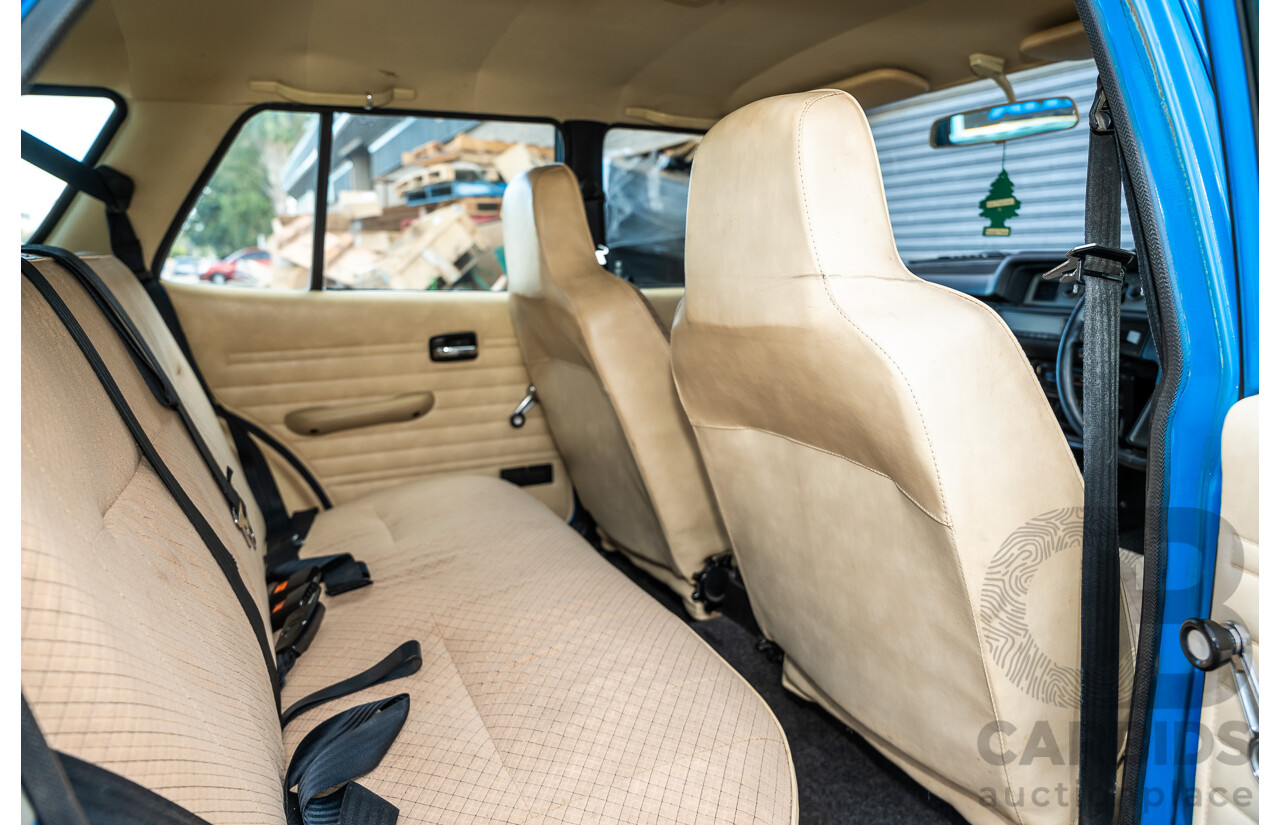 8/1980 Datsun 200b GL 810 4d Wagon Blue 2.0L