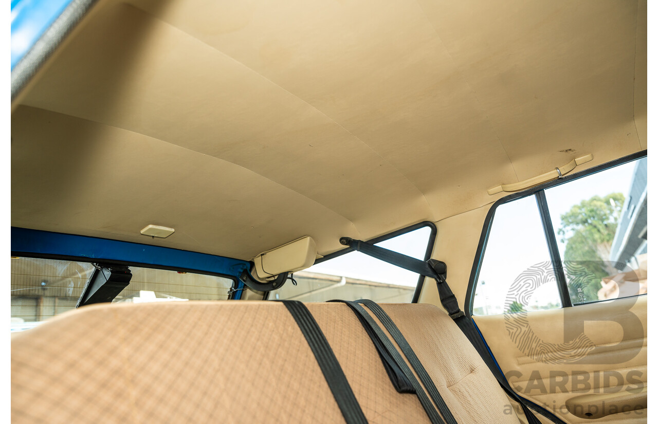 8/1980 Datsun 200b GL 810 4d Wagon Blue 2.0L