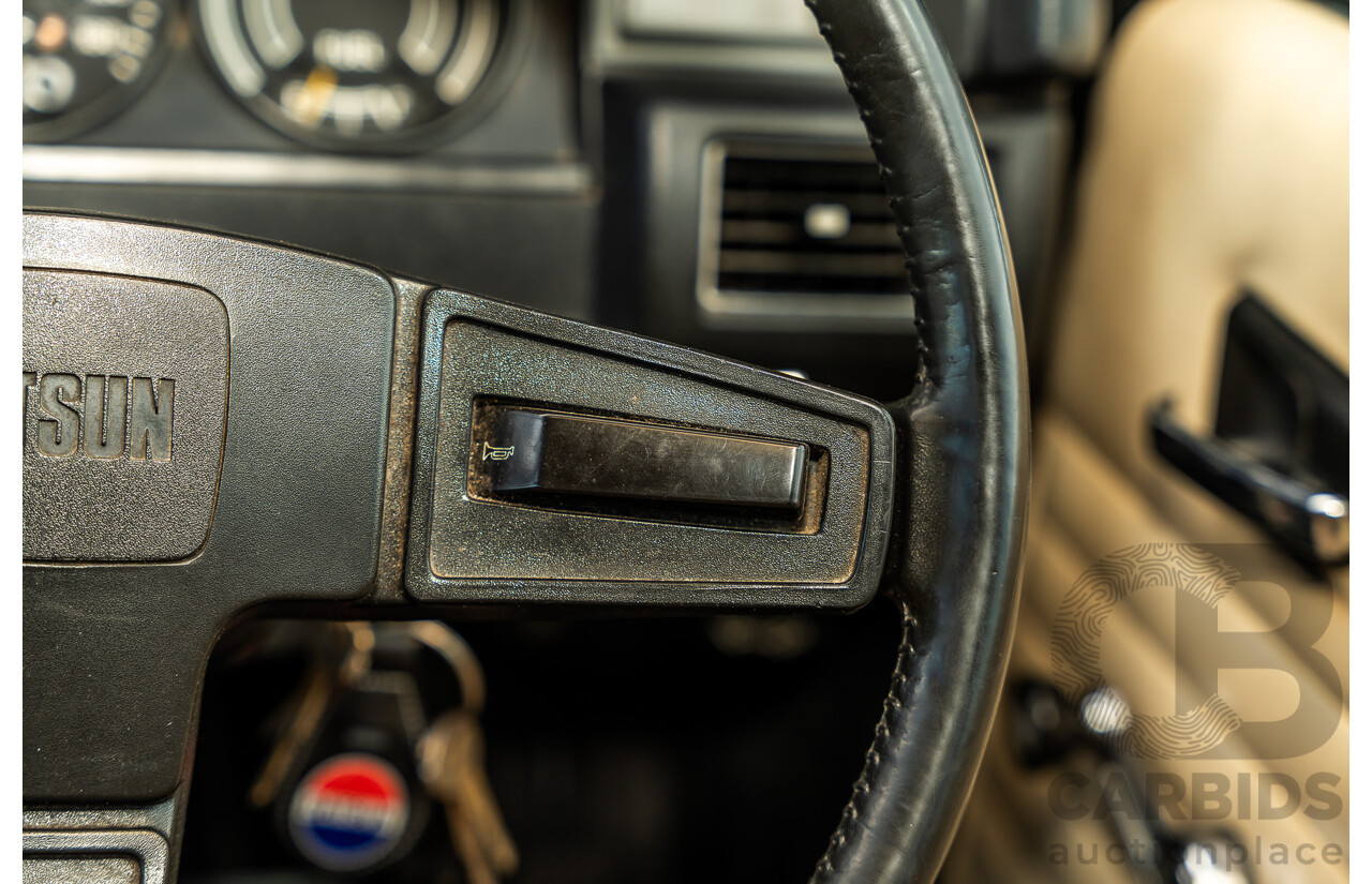 8/1980 Datsun 200b GL 810 4d Wagon Blue 2.0L