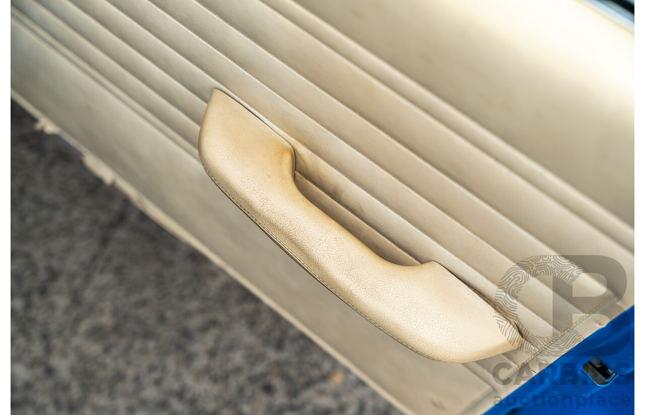 8/1980 Datsun 200b GL 810 4d Wagon Blue 2.0L