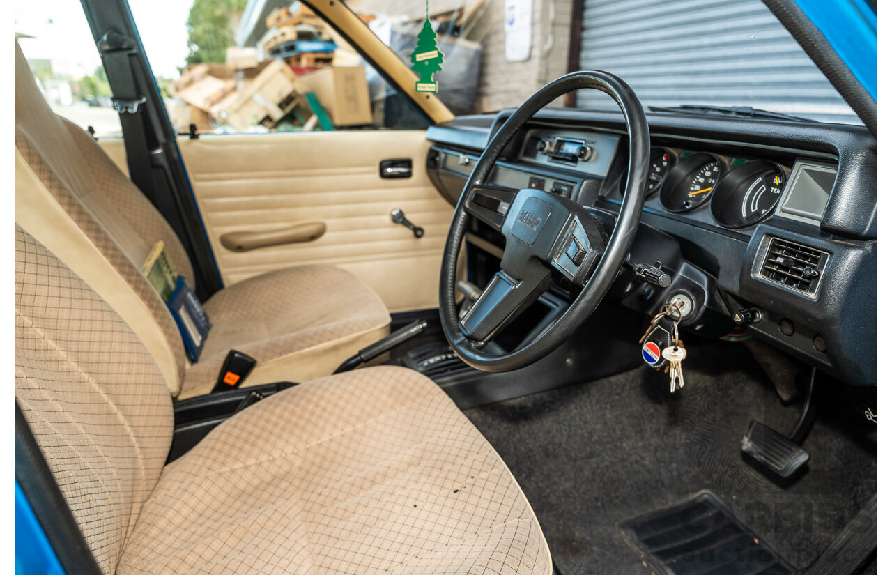 8/1980 Datsun 200b GL 810 4d Wagon Blue 2.0L