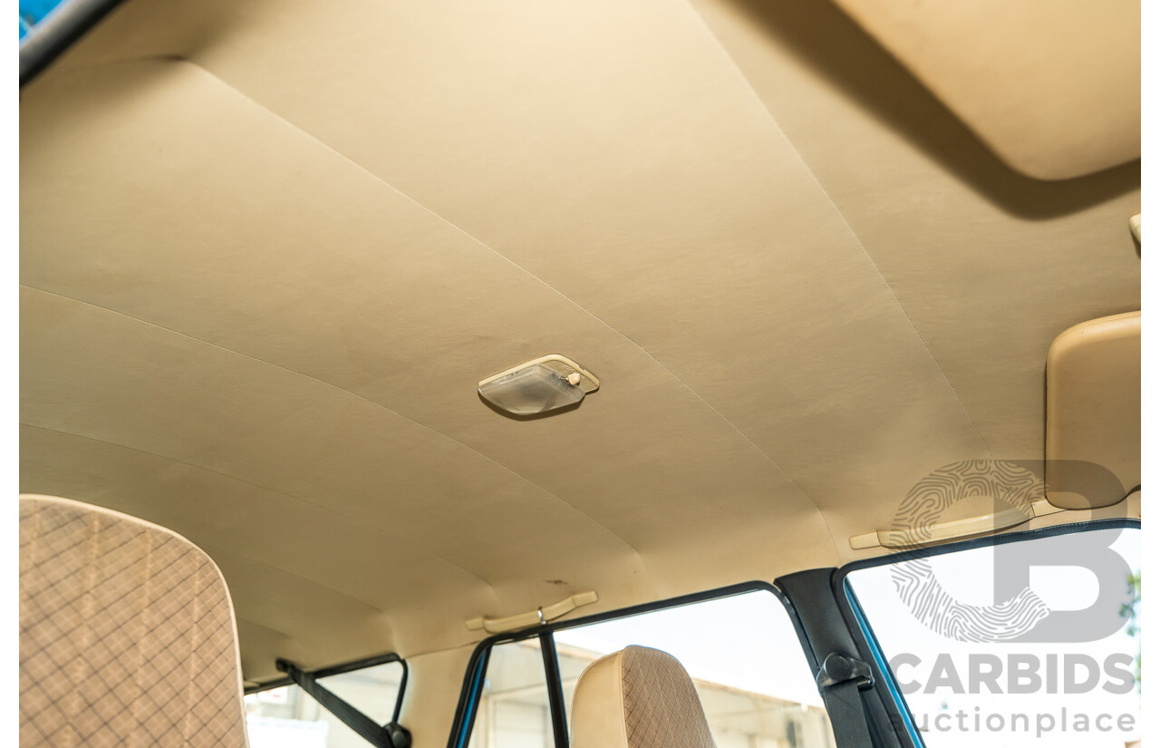 8/1980 Datsun 200b GL 810 4d Wagon Blue 2.0L