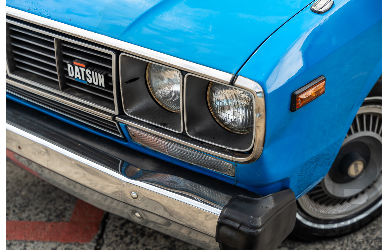 8/1980 Datsun 200b GL 810 4d Wagon Blue 2.0L