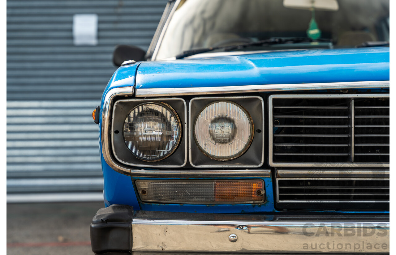 8/1980 Datsun 200b GL 810 4d Wagon Blue 2.0L