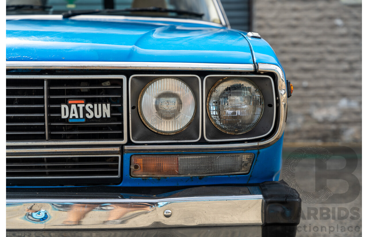 8/1980 Datsun 200b GL 810 4d Wagon Blue 2.0L