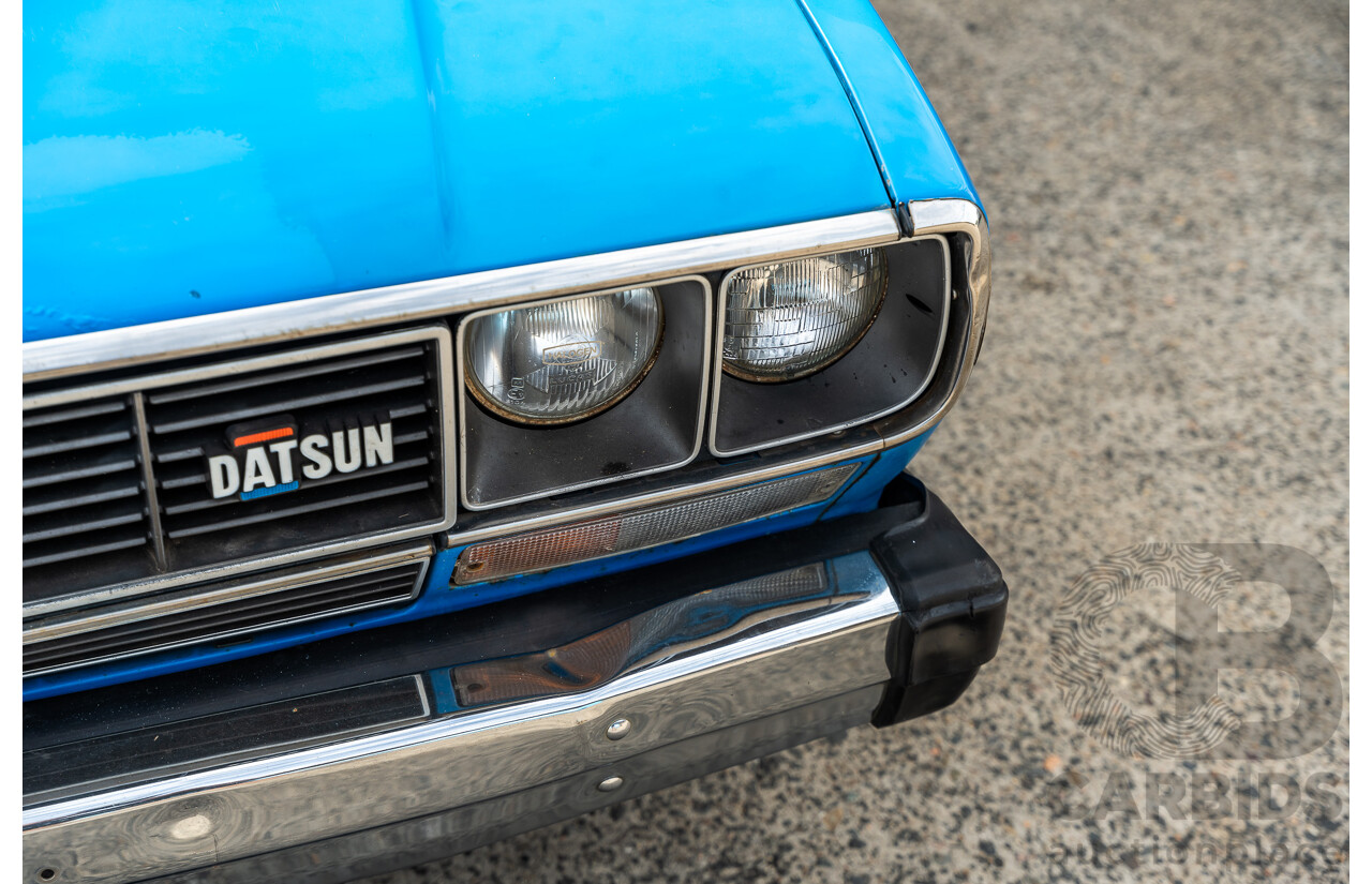 8/1980 Datsun 200b GL 810 4d Wagon Blue 2.0L