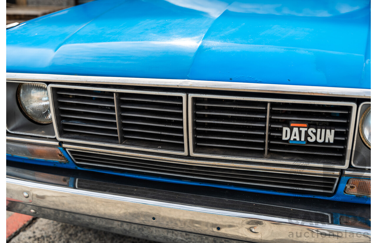 8/1980 Datsun 200b GL 810 4d Wagon Blue 2.0L
