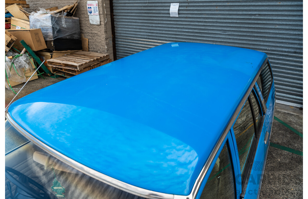 8/1980 Datsun 200b GL 810 4d Wagon Blue 2.0L