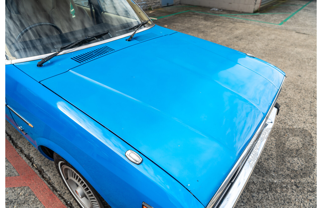 8/1980 Datsun 200b GL 810 4d Wagon Blue 2.0L