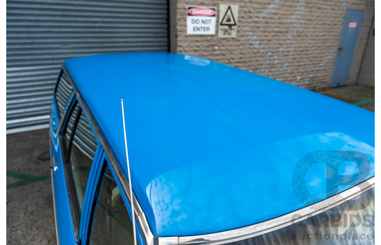 8/1980 Datsun 200b GL 810 4d Wagon Blue 2.0L