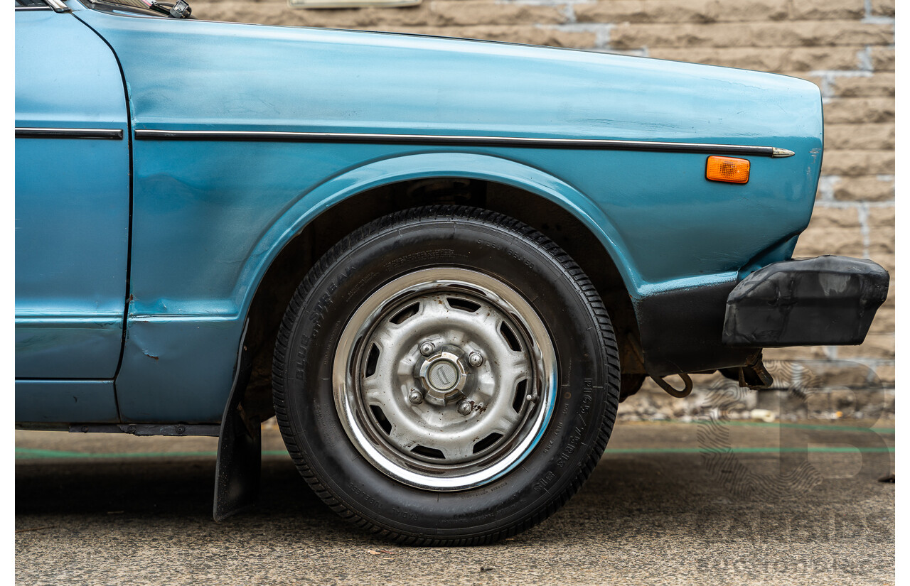 9/1979 Datsun Sunny B310 4d Wagon Blue 1.4L