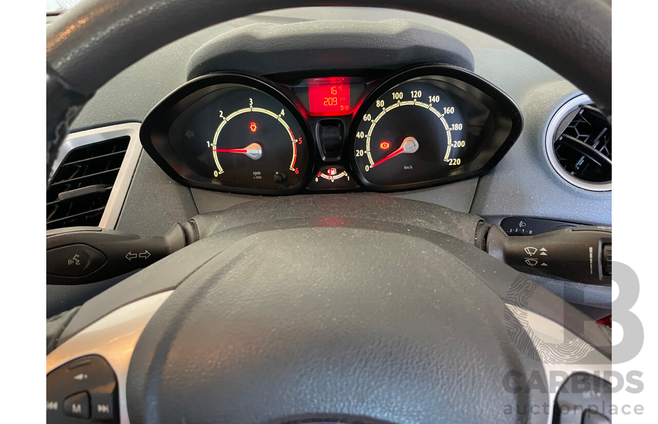 04/2010 Ford Fiesta ECONETIC FWD WS 5D Hatchback Red 1.6L