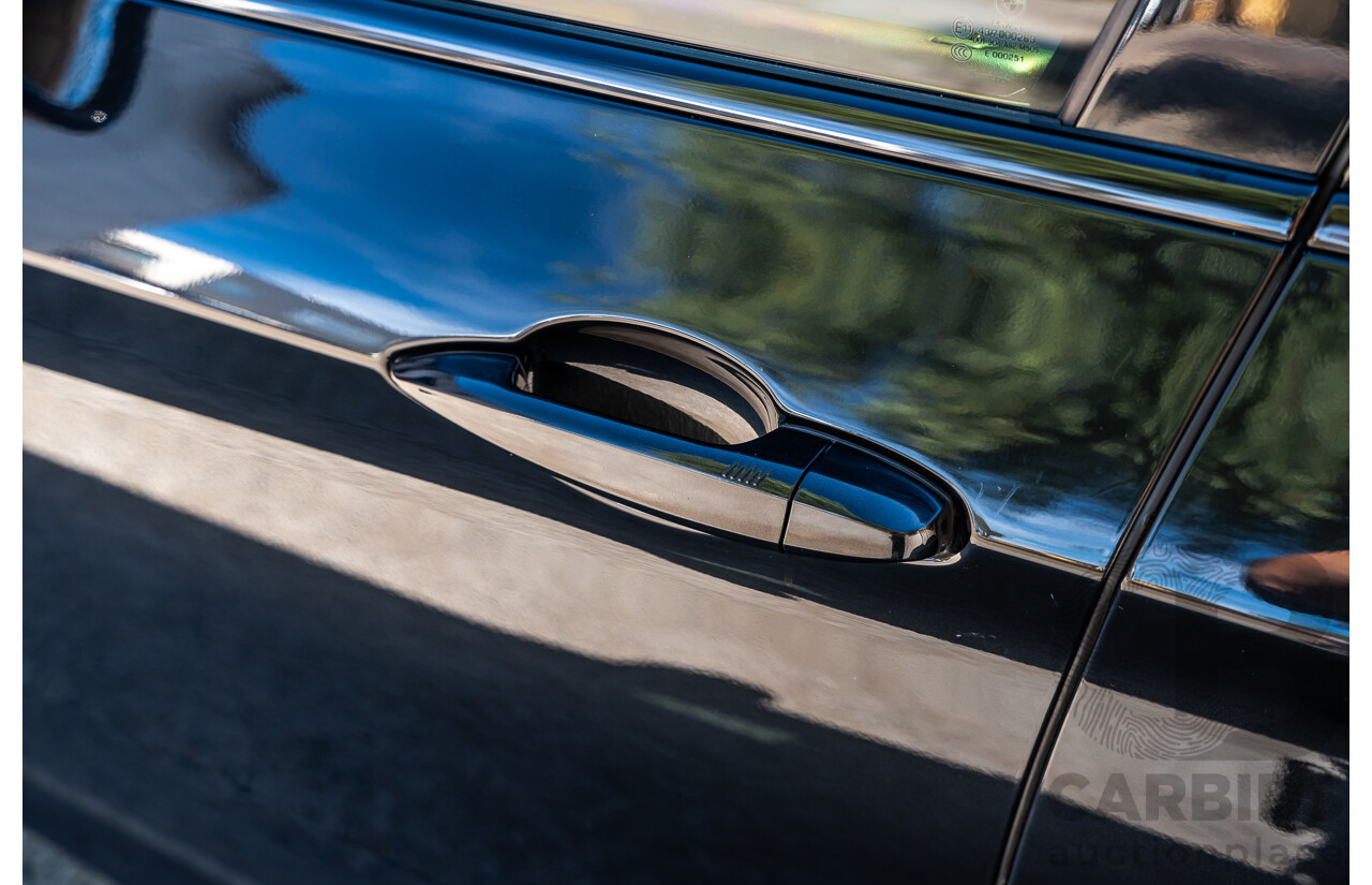 4/2014 BMW X5 Xdrive 50i F15 (AWD) MY14 M-Sport Pack 4d Wagon Sapphire Black Metallic Twin Turbo V8 4.4L