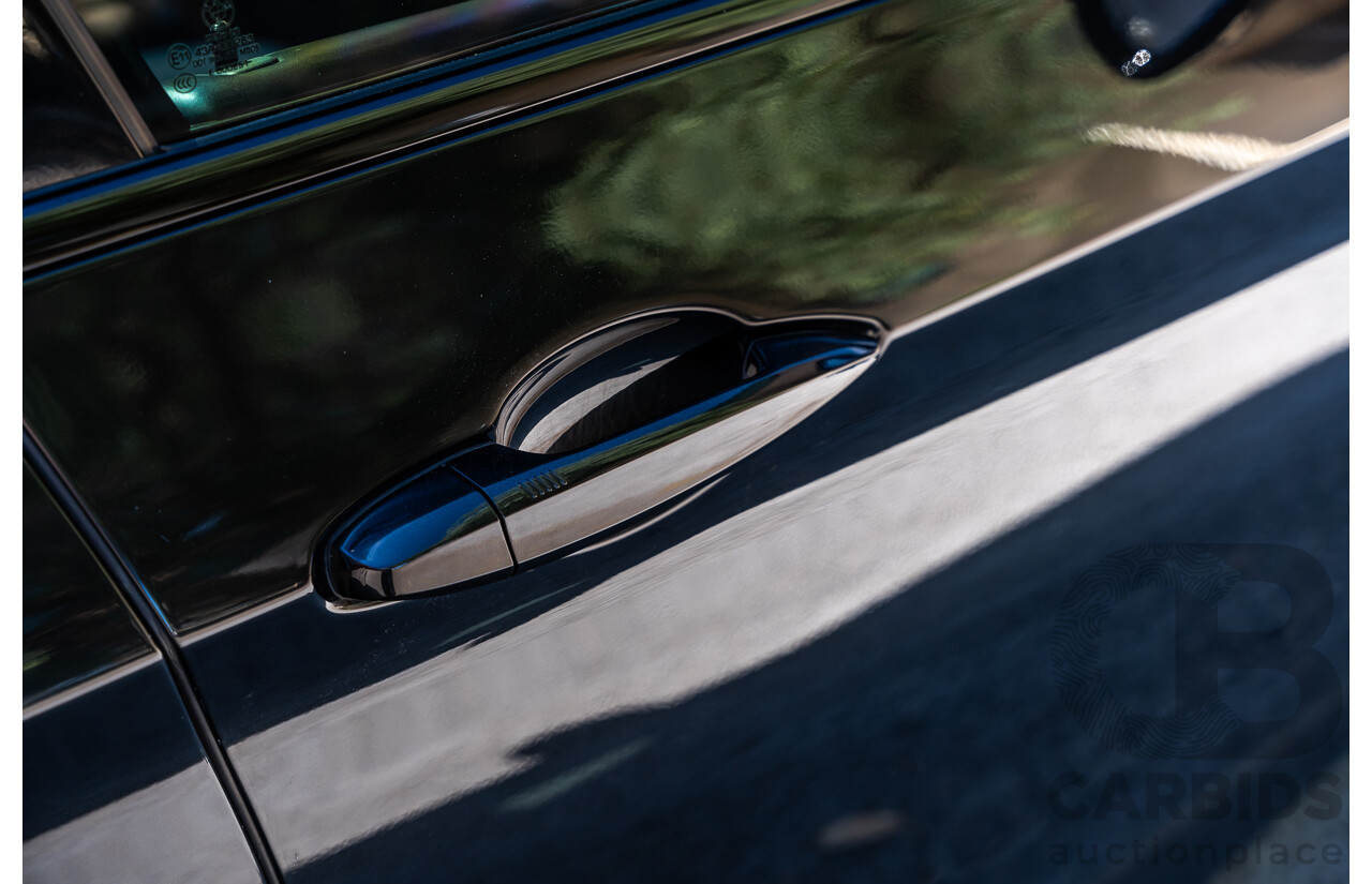 4/2014 BMW X5 Xdrive 50i F15 (AWD) MY14 M-Sport Pack 4d Wagon Sapphire Black Metallic Twin Turbo V8 4.4L