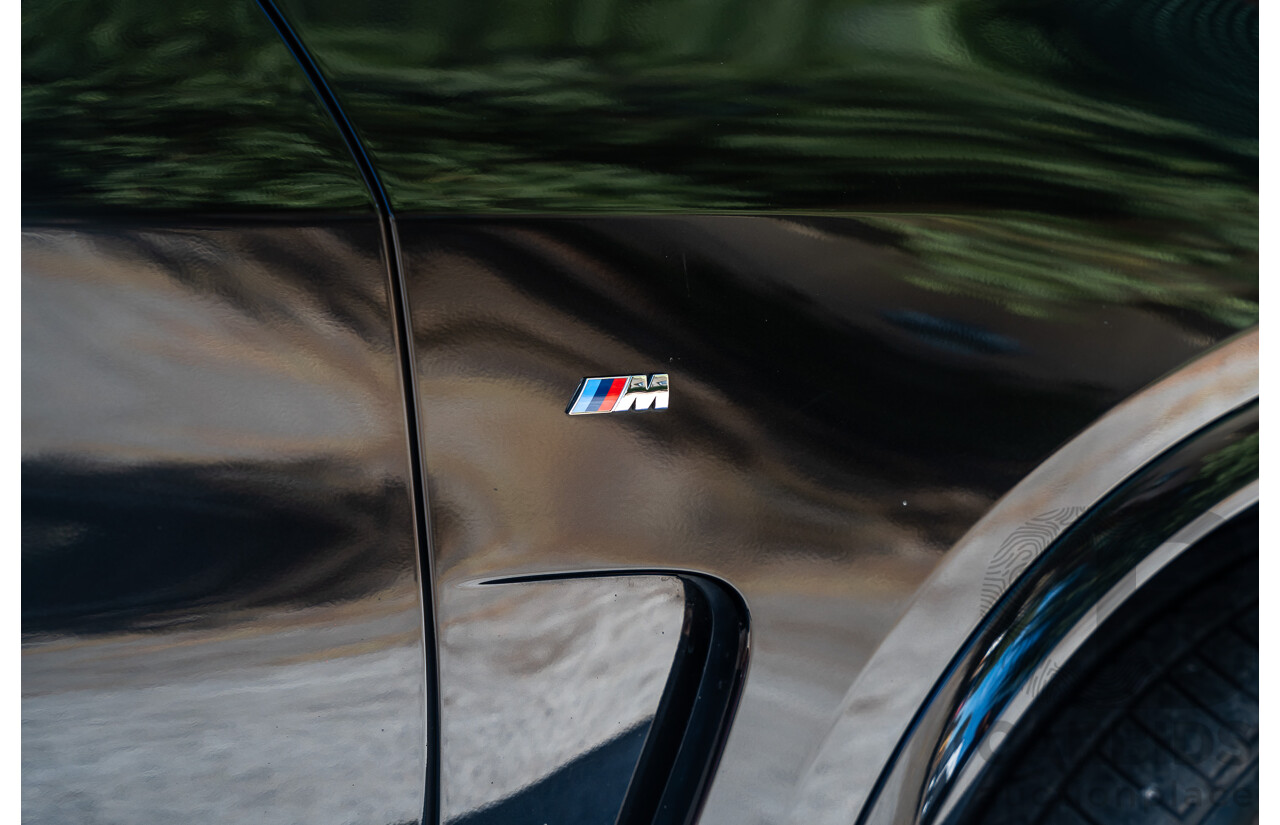 4/2014 BMW X5 Xdrive 50i F15 (AWD) MY14 M-Sport Pack 4d Wagon Sapphire Black Metallic Twin Turbo V8 4.4L