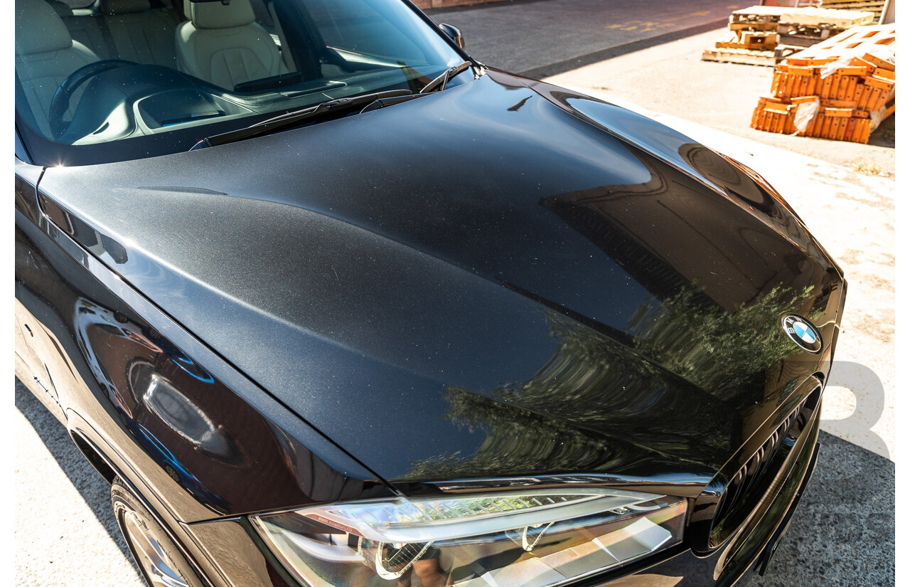 4/2014 BMW X5 Xdrive 50i F15 (AWD) MY14 M-Sport Pack 4d Wagon Sapphire Black Metallic Twin Turbo V8 4.4L