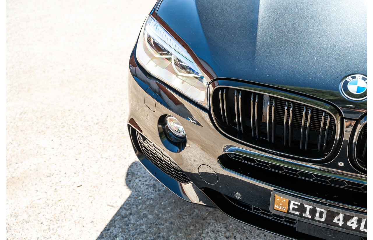 4/2014 BMW X5 Xdrive 50i F15 (AWD) MY14 M-Sport Pack 4d Wagon Sapphire Black Metallic Twin Turbo V8 4.4L