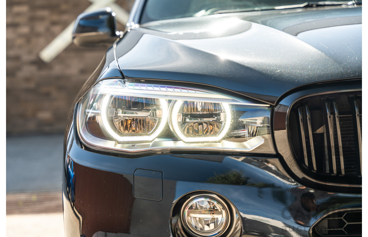 4/2014 BMW X5 Xdrive 50i F15 (AWD) MY14 M-Sport Pack 4d Wagon Sapphire Black Metallic Twin Turbo V8 4.4L