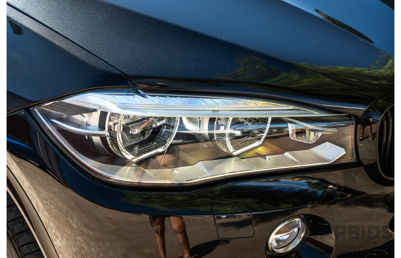 4/2014 BMW X5 Xdrive 50i F15 (AWD) MY14 M-Sport Pack 4d Wagon Sapphire Black Metallic Twin Turbo V8 4.4L