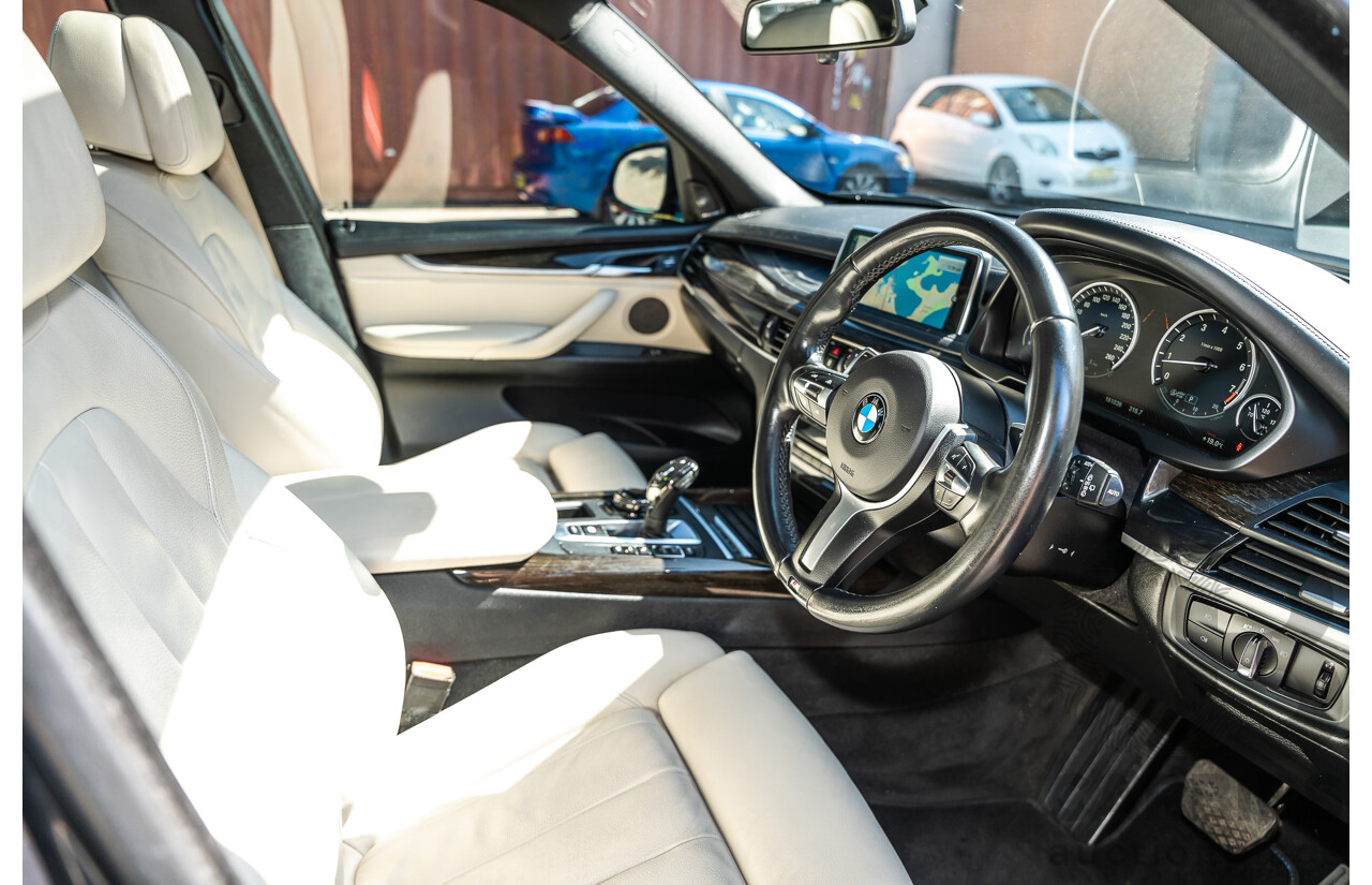 4/2014 BMW X5 Xdrive 50i F15 (AWD) MY14 M-Sport Pack 4d Wagon Sapphire Black Metallic Twin Turbo V8 4.4L