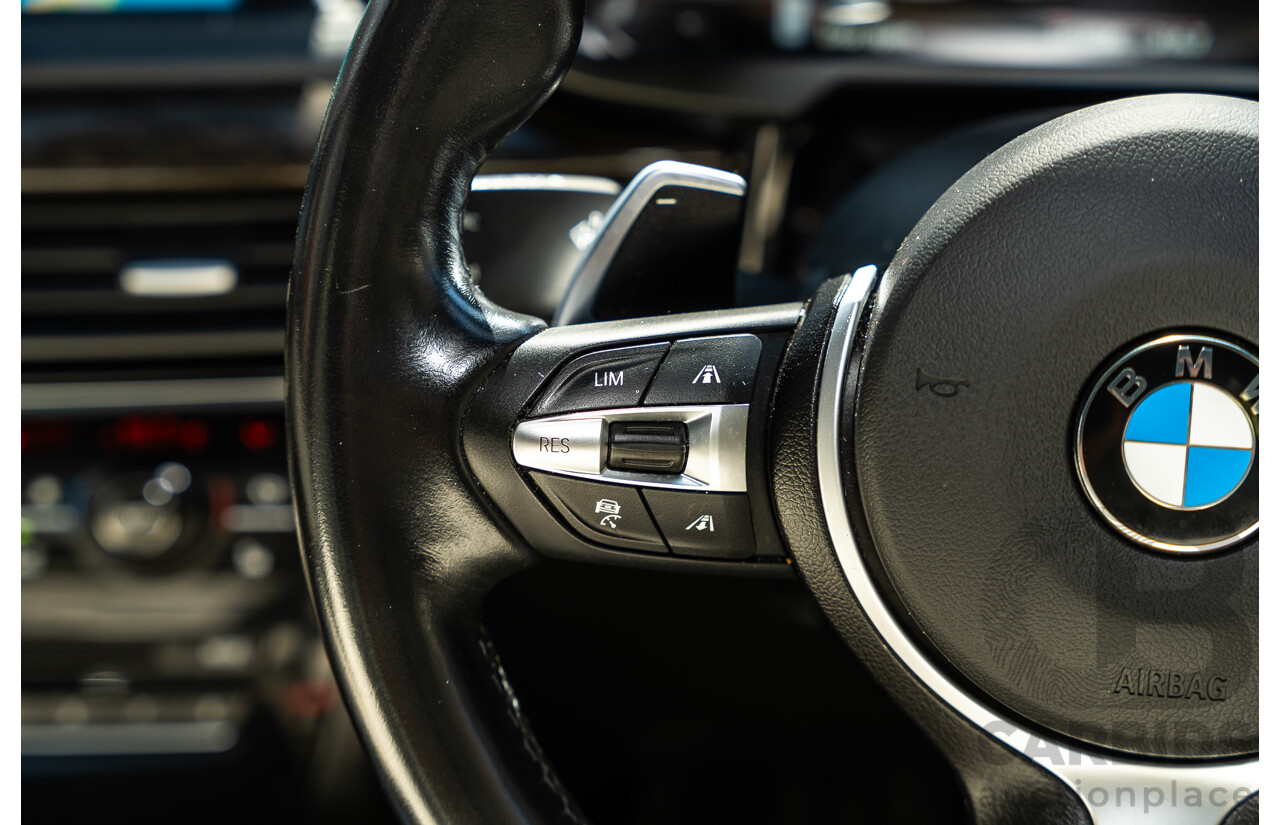 4/2014 BMW X5 Xdrive 50i F15 (AWD) MY14 M-Sport Pack 4d Wagon Sapphire Black Metallic Twin Turbo V8 4.4L