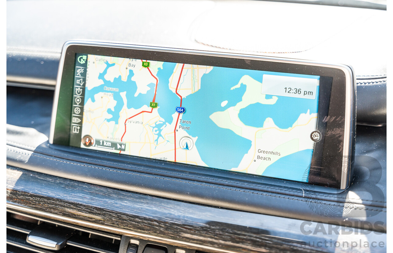 4/2014 BMW X5 Xdrive 50i F15 (AWD) MY14 M-Sport Pack 4d Wagon Sapphire Black Metallic Twin Turbo V8 4.4L