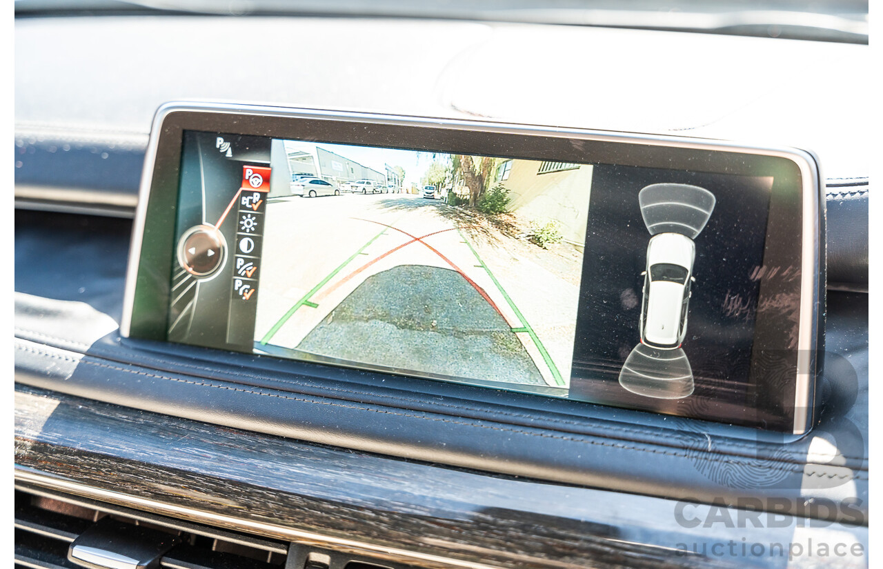 4/2014 BMW X5 Xdrive 50i F15 (AWD) MY14 M-Sport Pack 4d Wagon Sapphire Black Metallic Twin Turbo V8 4.4L