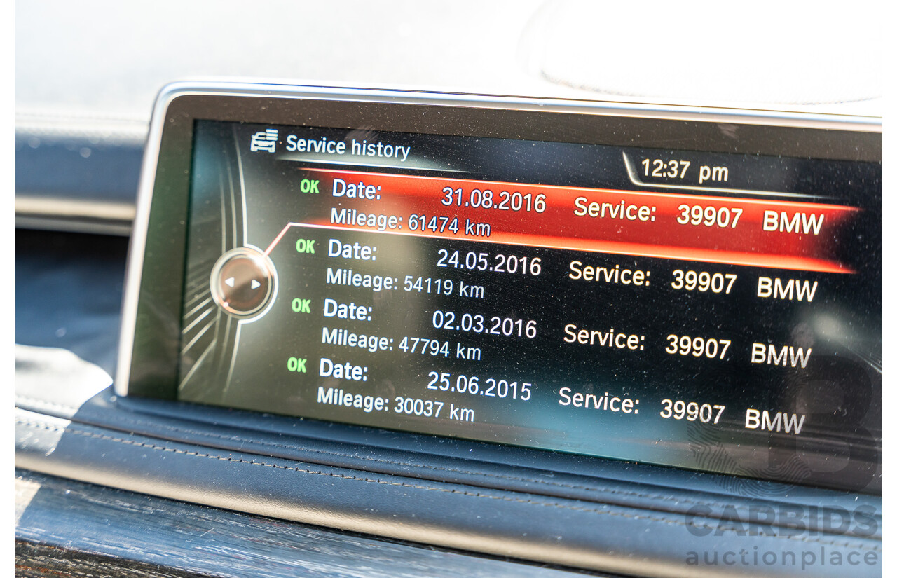 4/2014 BMW X5 Xdrive 50i F15 (AWD) MY14 M-Sport Pack 4d Wagon Sapphire Black Metallic Twin Turbo V8 4.4L