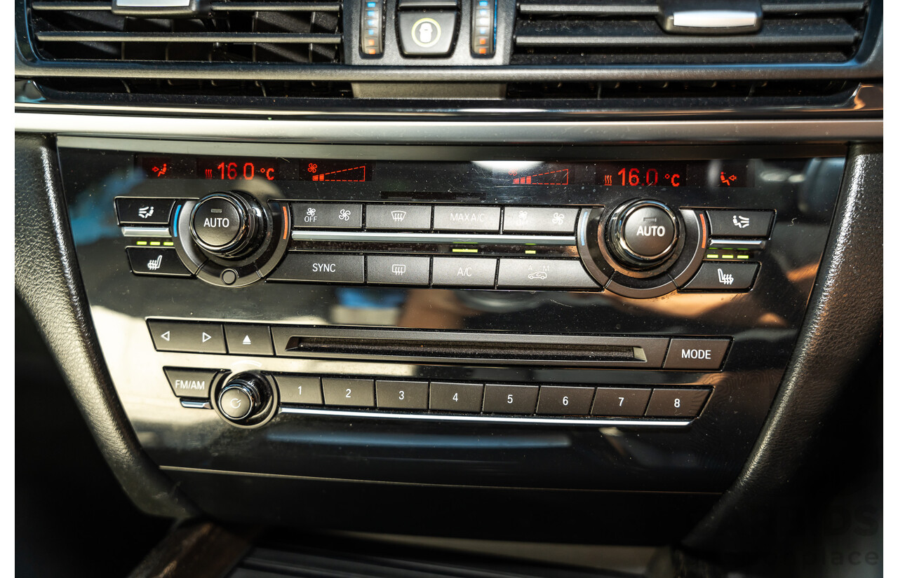 4/2014 BMW X5 Xdrive 50i F15 (AWD) MY14 M-Sport Pack 4d Wagon Sapphire Black Metallic Twin Turbo V8 4.4L