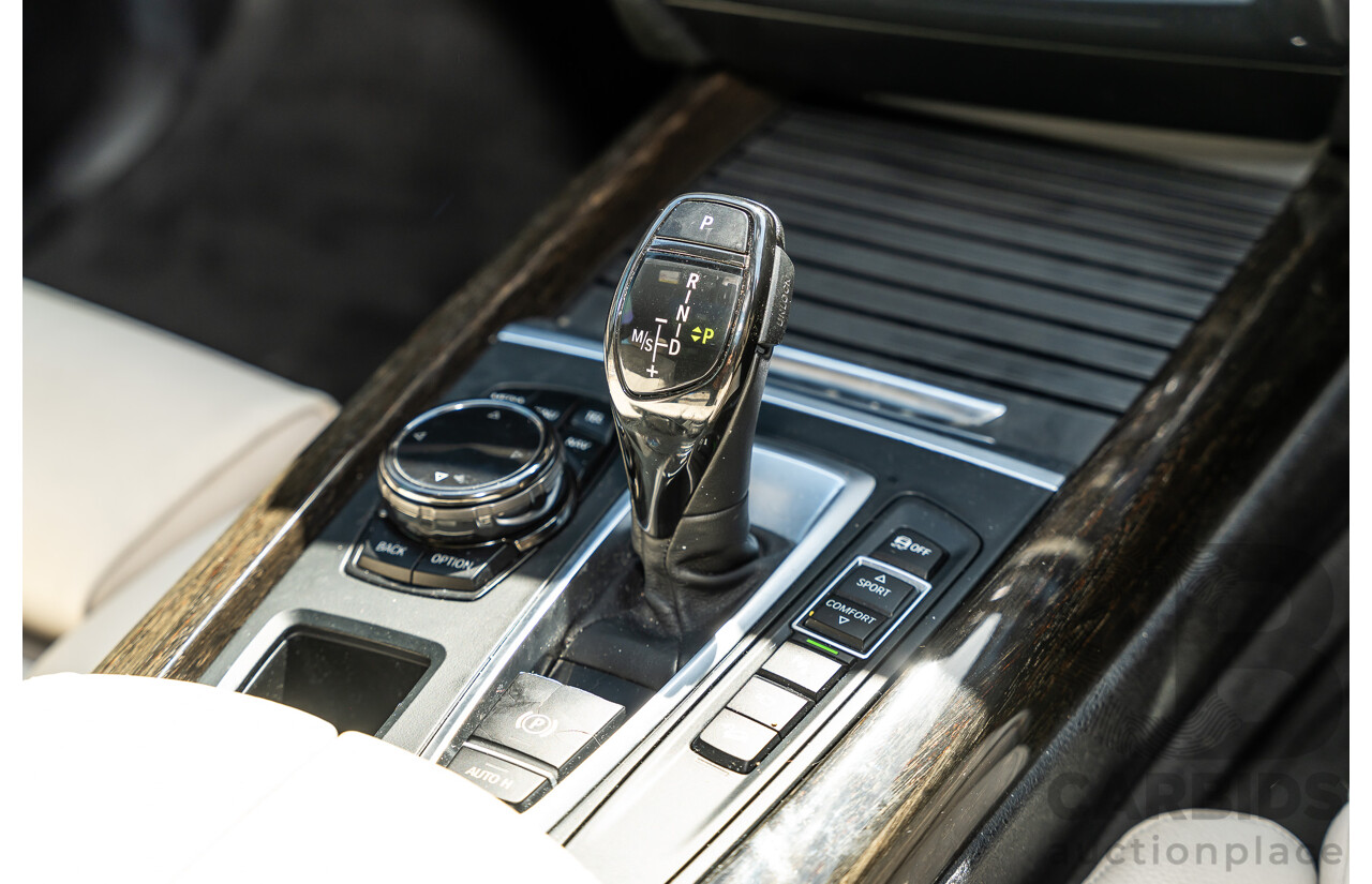 4/2014 BMW X5 Xdrive 50i F15 (AWD) MY14 M-Sport Pack 4d Wagon Sapphire Black Metallic Twin Turbo V8 4.4L