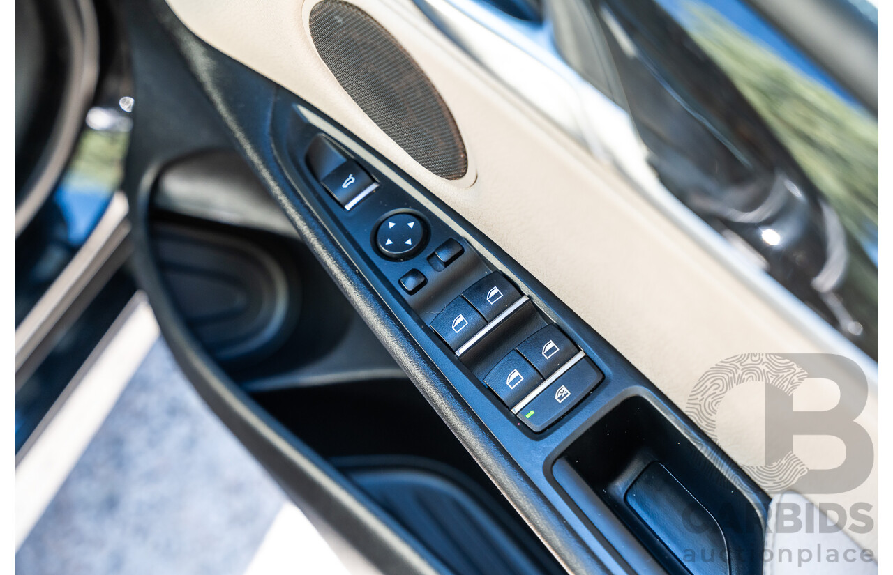 4/2014 BMW X5 Xdrive 50i F15 (AWD) MY14 M-Sport Pack 4d Wagon Sapphire Black Metallic Twin Turbo V8 4.4L