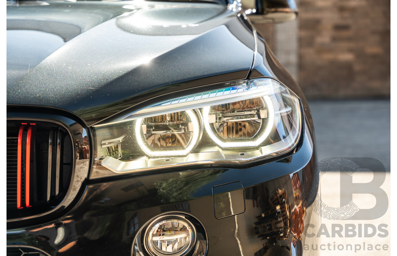 4/2014 BMW X5 Xdrive 50i F15 (AWD) MY14 M-Sport Pack 4d Wagon Sapphire Black Metallic Twin Turbo V8 4.4L