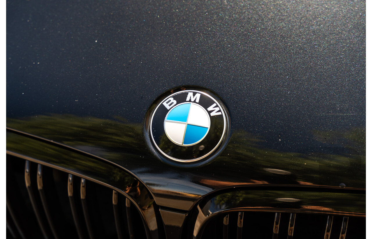 4/2014 BMW X5 Xdrive 50i F15 (AWD) MY14 M-Sport Pack 4d Wagon Sapphire Black Metallic Twin Turbo V8 4.4L