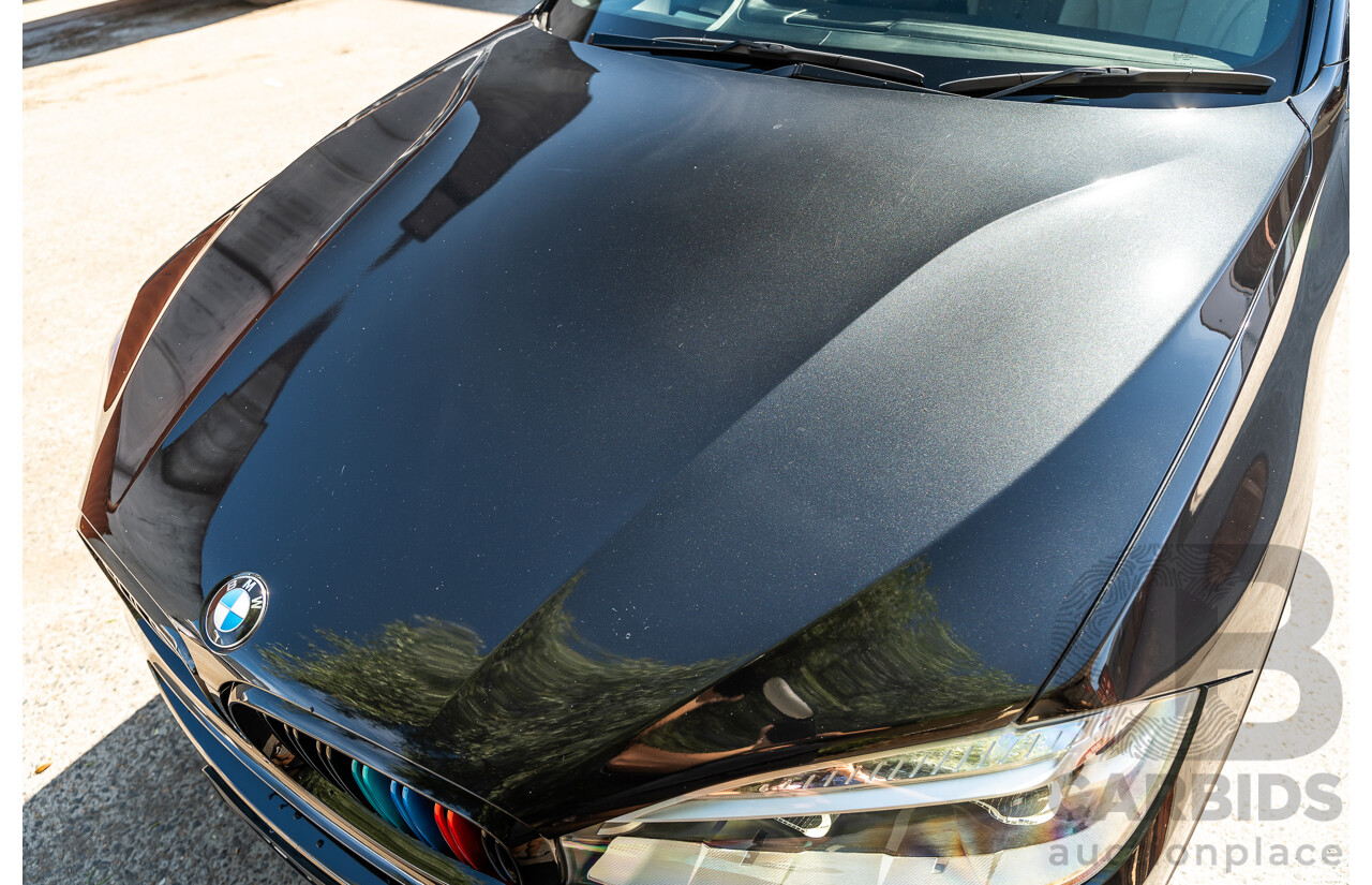 4/2014 BMW X5 Xdrive 50i F15 (AWD) MY14 M-Sport Pack 4d Wagon Sapphire Black Metallic Twin Turbo V8 4.4L