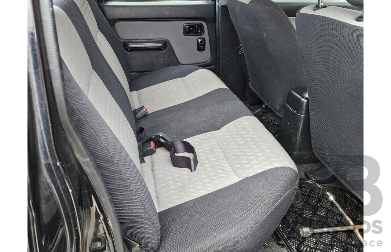 7/2009 Nissan Navara ST-R (4x4) D22 MY08 Dual Cab P/Up Black 2.5L