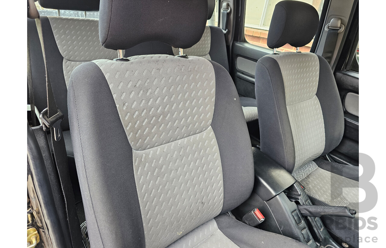 7/2009 Nissan Navara ST-R (4x4) D22 MY08 Dual Cab P/Up Black 2.5L