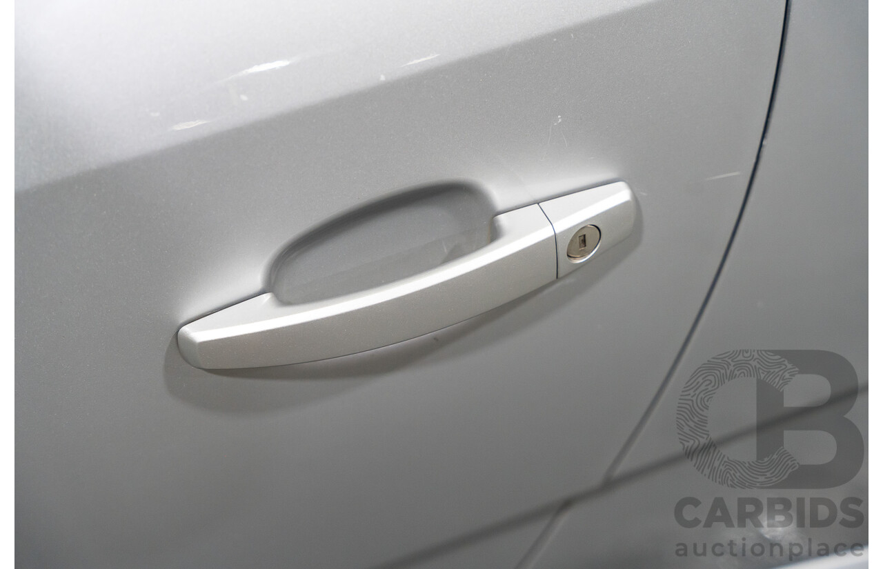 1/2006 Holden Tigra  XC MY06 2d Convertible Metallic Silver 1.8L