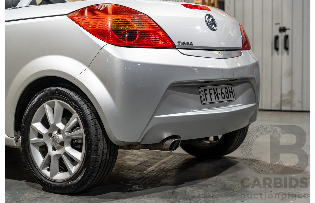 1/2006 Holden Tigra  XC MY06 2d Convertible Metallic Silver 1.8L