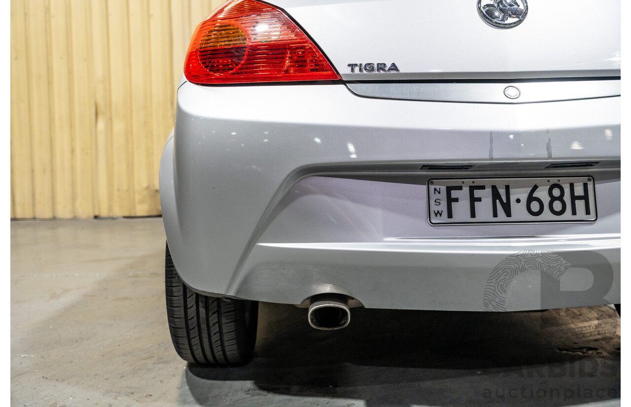 1/2006 Holden Tigra  XC MY06 2d Convertible Metallic Silver 1.8L